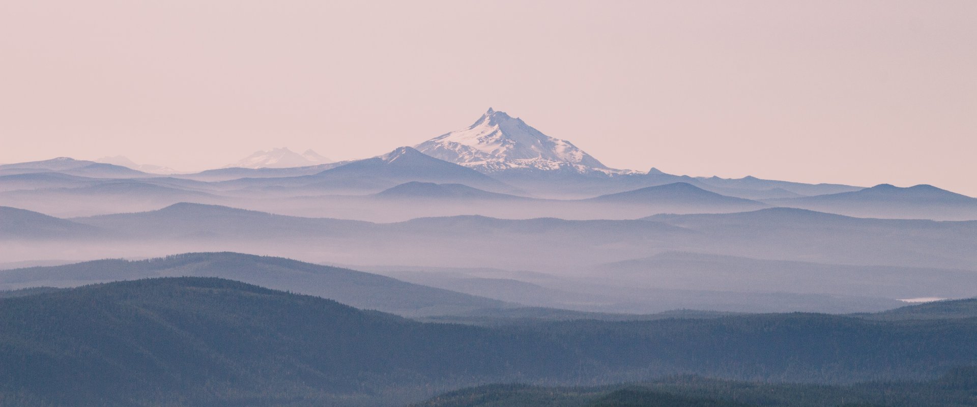 Sunset over a smoky mountain in Oregon