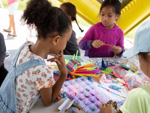 a child plays with crafts