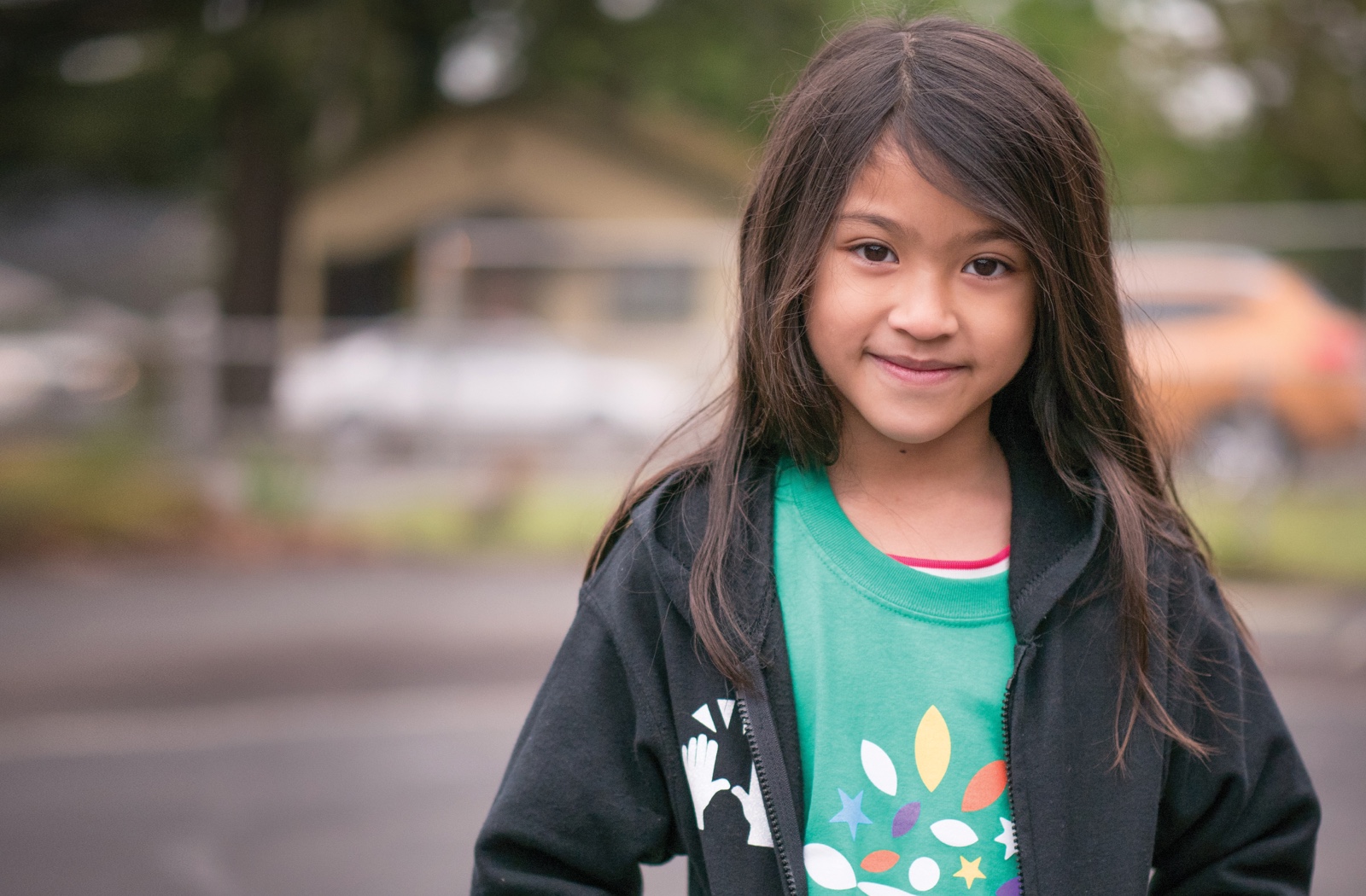 A volunteer at Woodmere Elementary, Comcast Cares Day